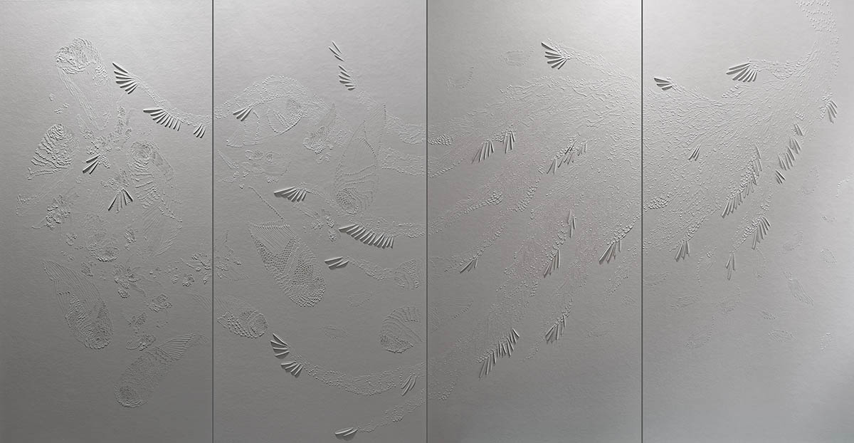 Paper cut art of bird wings, feathers and flowers by Dana Shek.